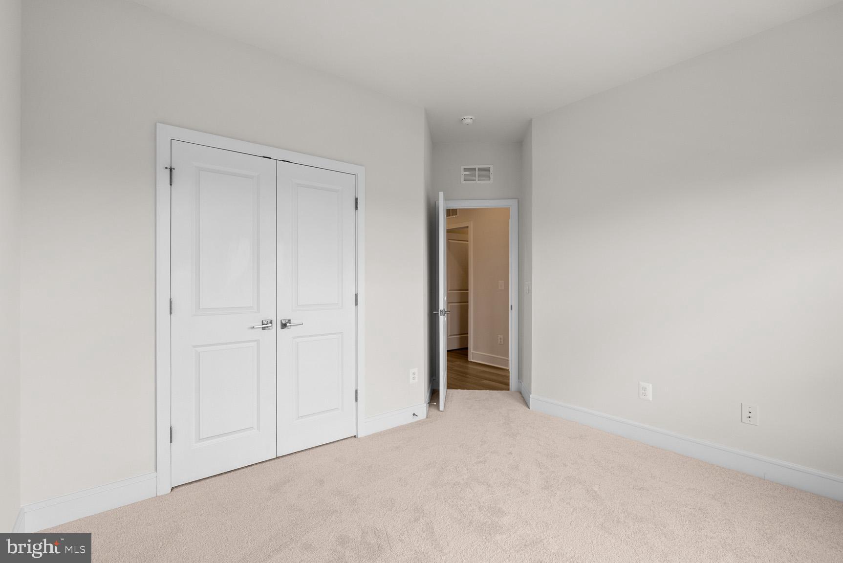 43423 Farringdon Square Ashburn, VA 20148 - Photo 26 of 31 a view of an empty room and closet area