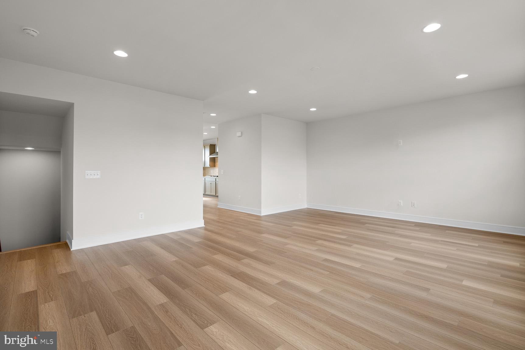 43423 Farringdon Square Ashburn, VA 20148 - Photo 8 of 31 a view of empty room with wooden floor