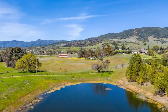 a view of an ocean and a mountain