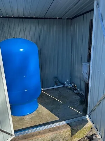 an empty room with wooden floor