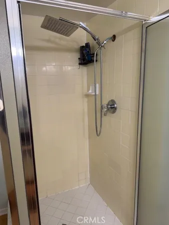 a bedroom with a bed and dresser