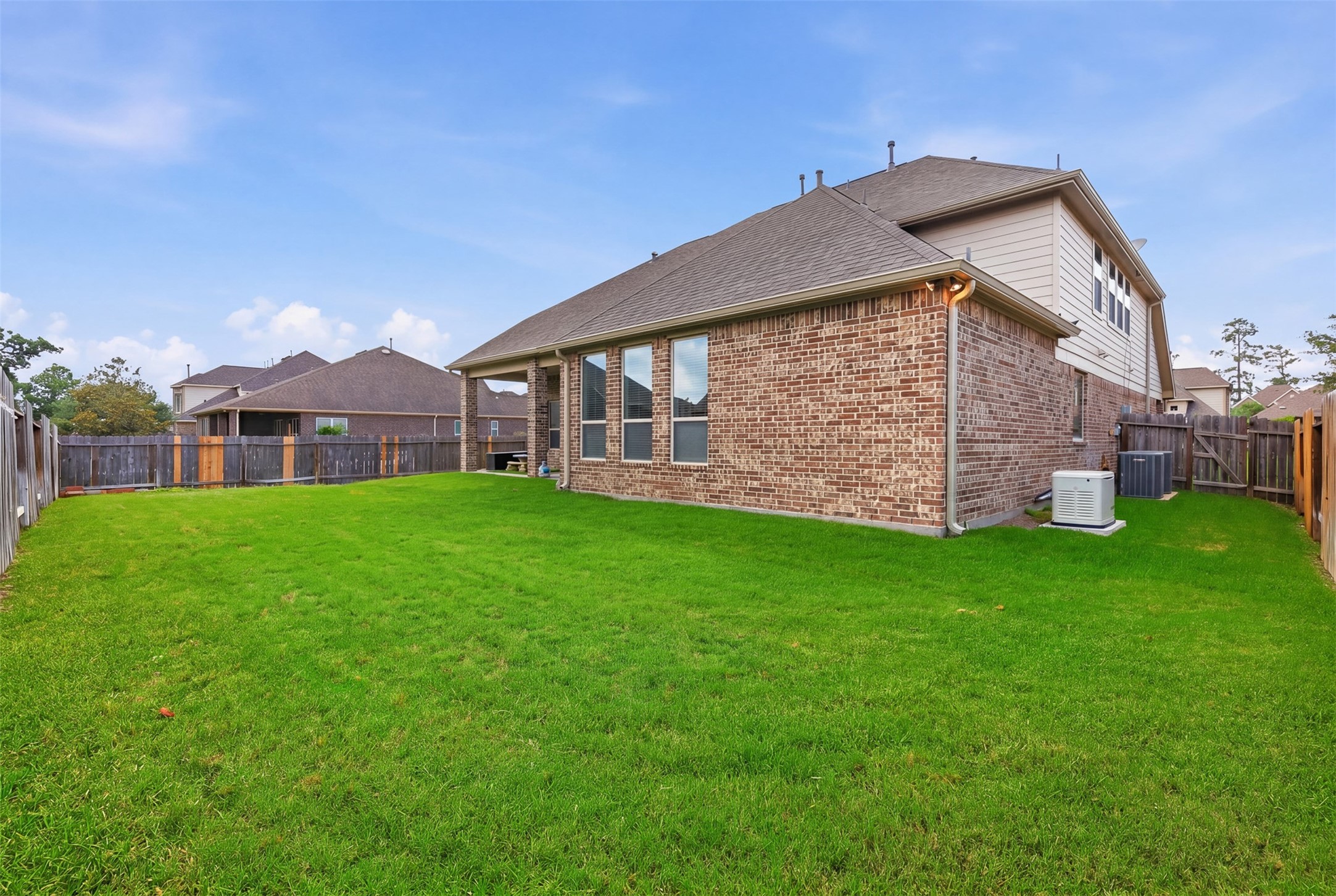 6835 Preston Grove Drive Spring, TX 77389 - Photo 44 of 49 a view of a house with a yard