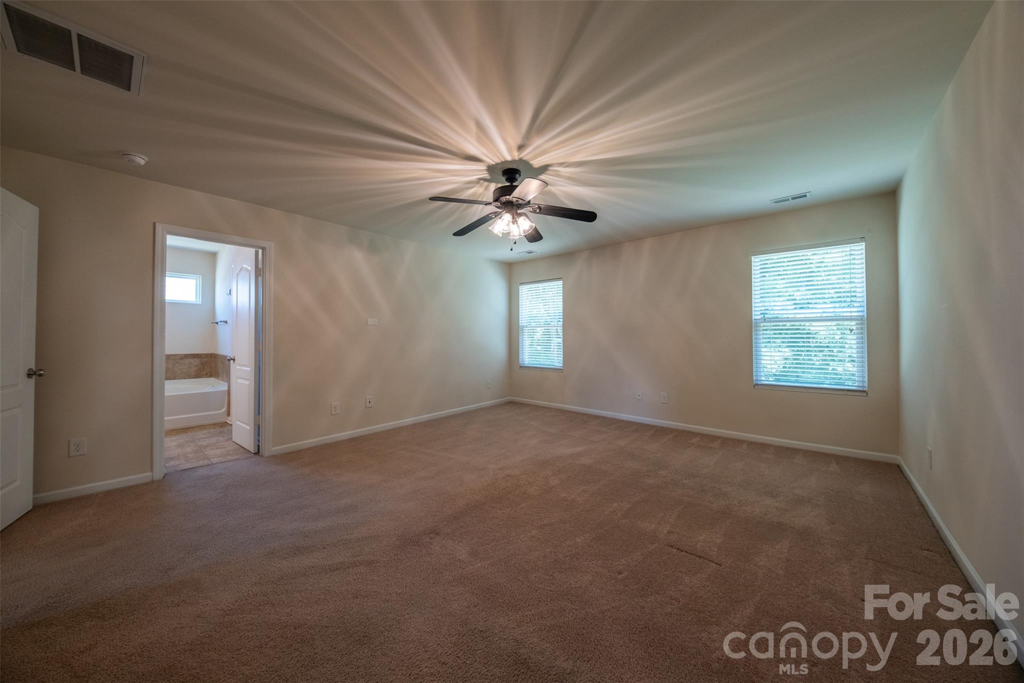 3006 Houndscroft Road Indian Trail, NC 28079 - Photo 33 of 39 wooden floor in an empty room with a window