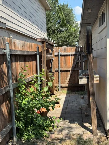 a view of a backyard of the house