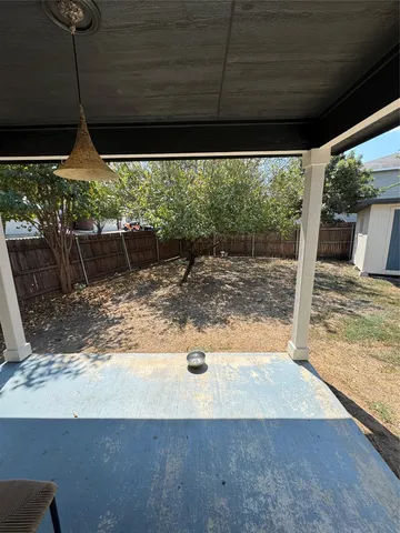 a view of a patio with a ocean view