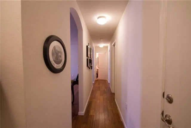 a dining room with furniture and chandelier