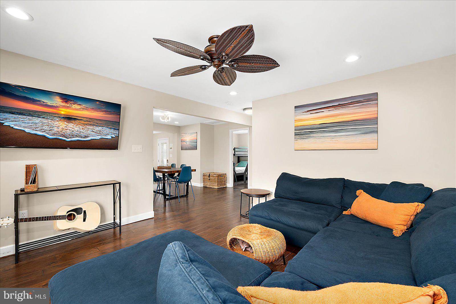 10428 Exeter Road Ocean City, MD 21842 - Photo 15 of 56 a living room with furniture and a flat screen tv