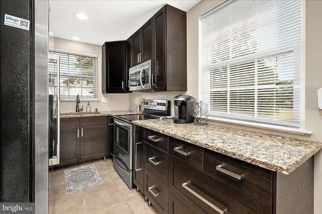a bedroom with furniture and flat screen tv