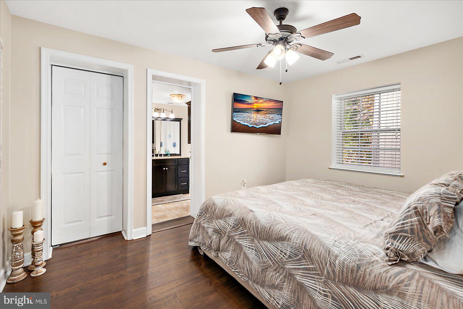 10428 Exeter Road Ocean City, MD 21842 - Photo 23 of 56 a bedroom with a bed and a window