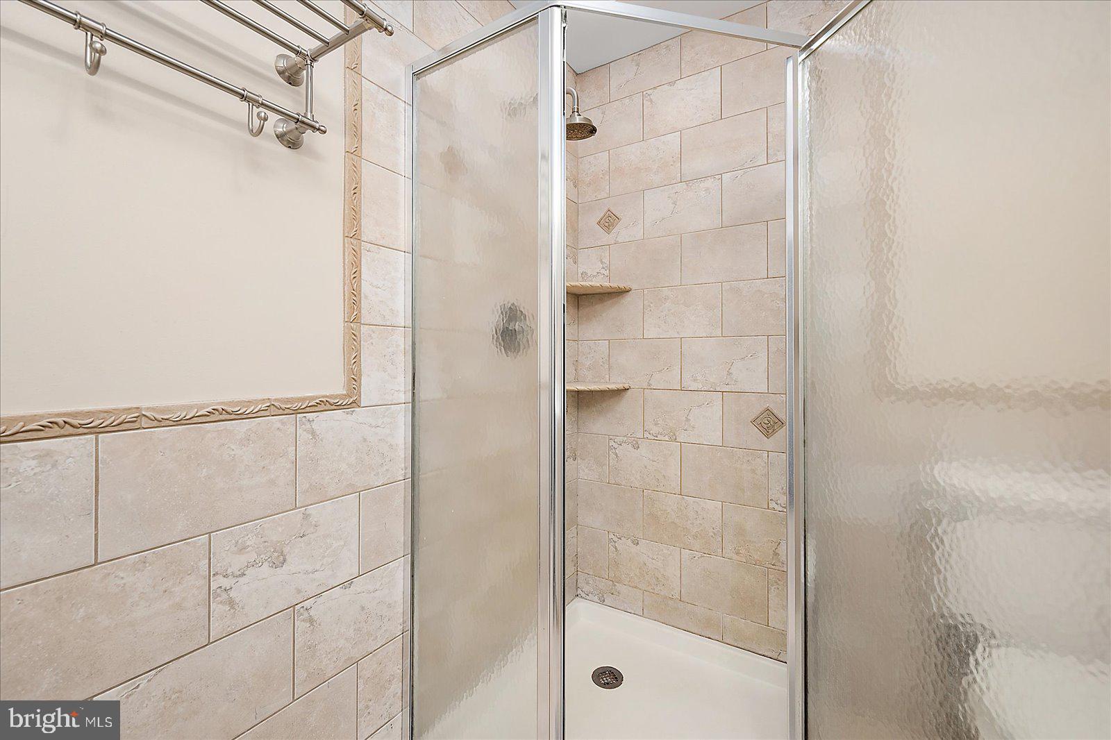 10428 Exeter Road Ocean City, MD 21842 - Photo 34 of 56 a bathroom with a shower