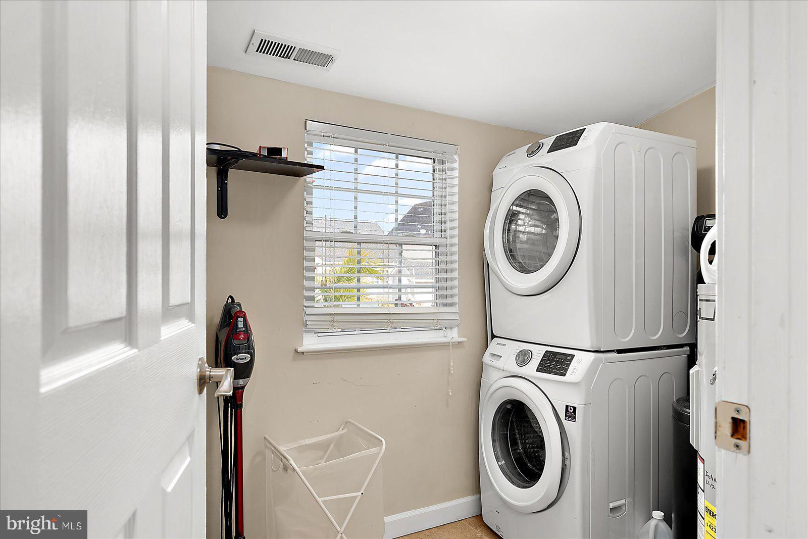 10428 Exeter Road Ocean City, MD 21842 - Photo 38 of 56 a utility room with dryer and washer