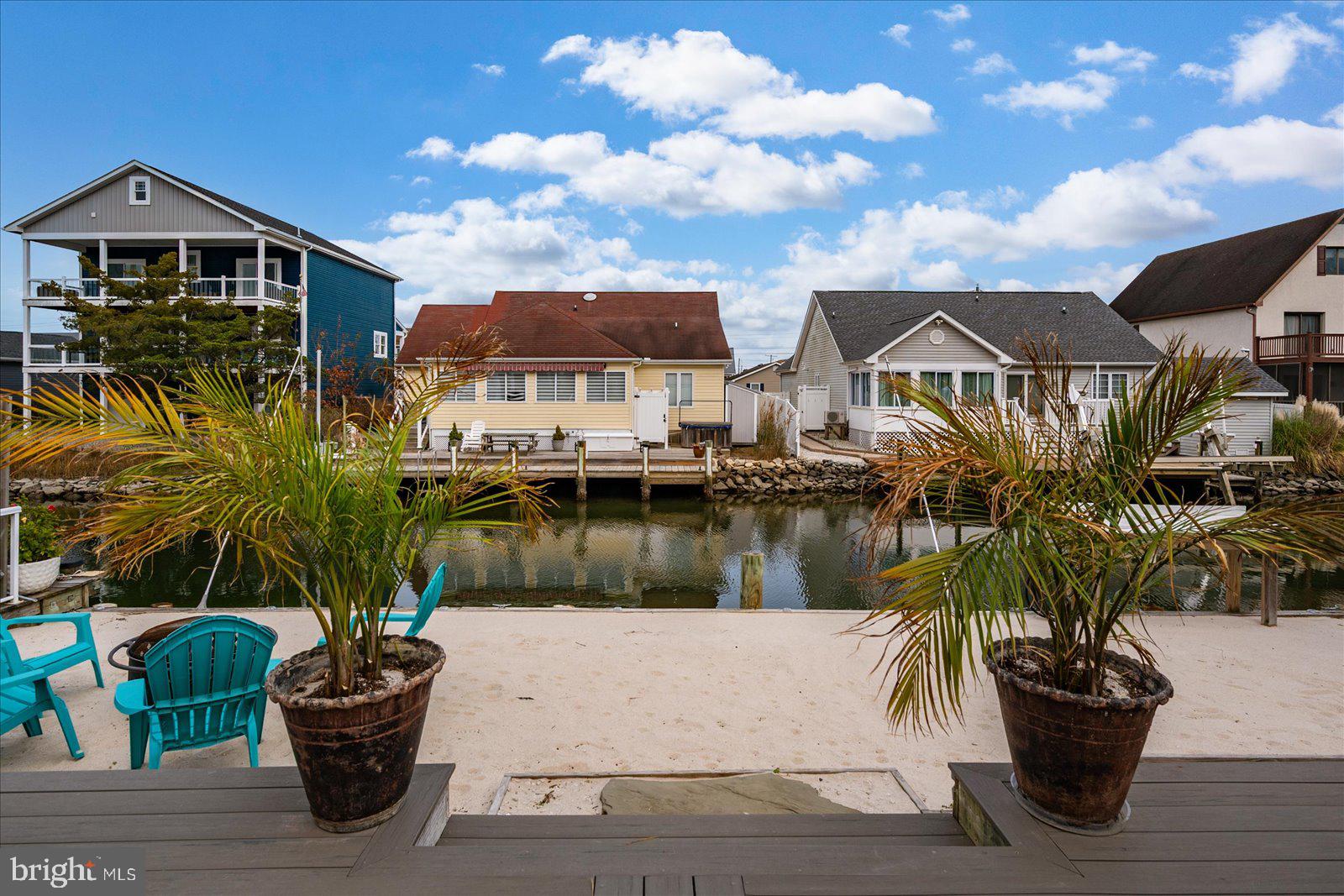 10428 Exeter Road Ocean City, MD 21842 - Photo 45 of 56 a view of a lake with a house in the background