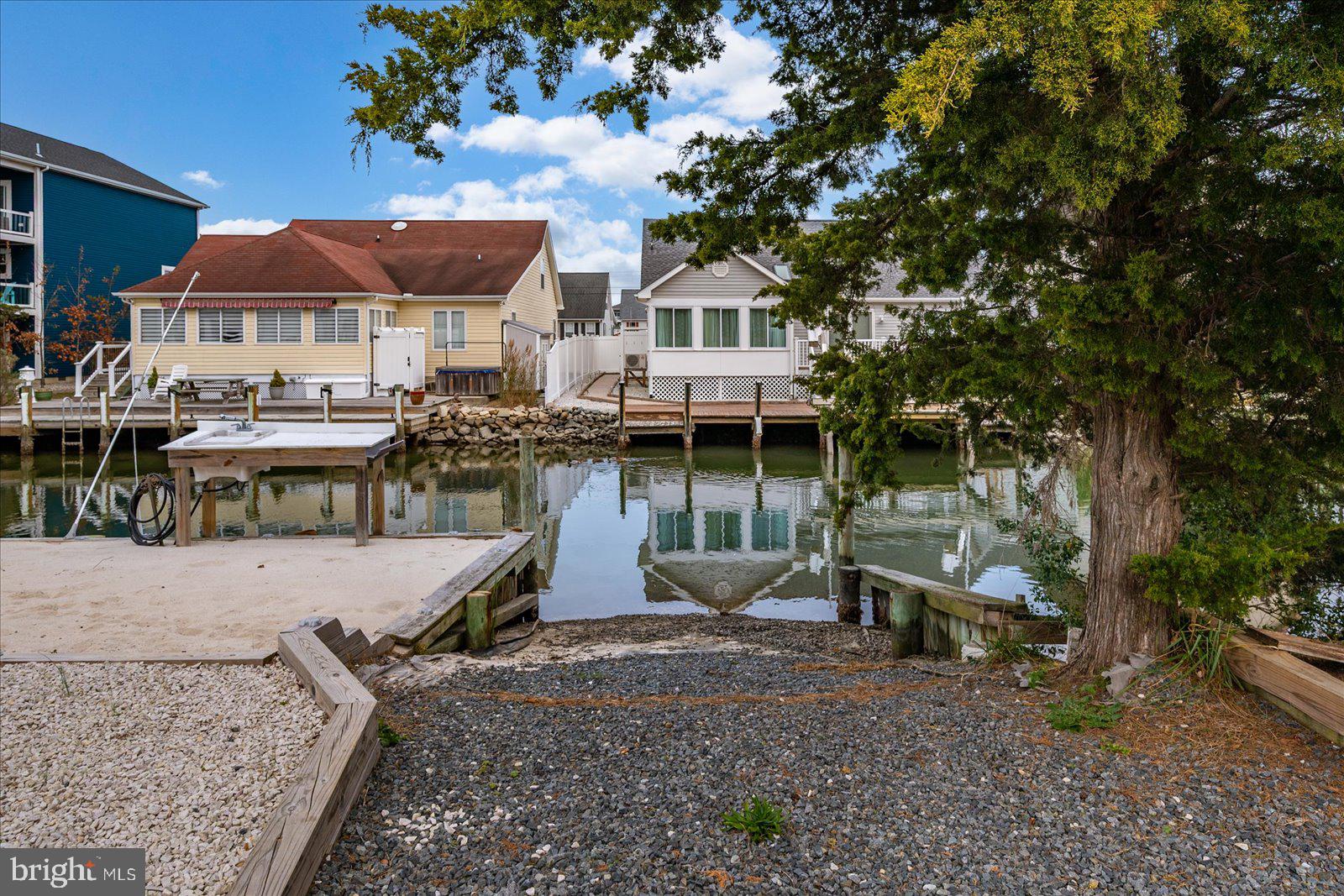 10428 Exeter Road Ocean City, MD 21842 - Photo 46 of 56 a view of a house with backyard porch and sitting area