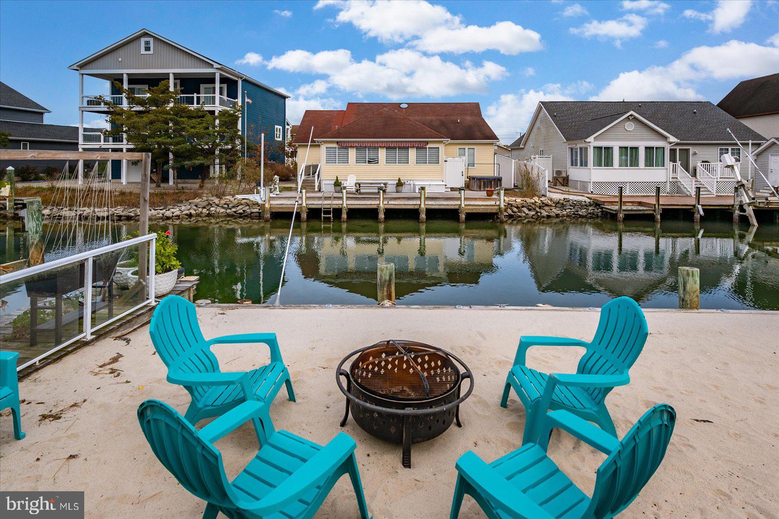 10428 Exeter Road Ocean City, MD 21842 - Photo 5 of 56 a view of a house with pool and a chairs