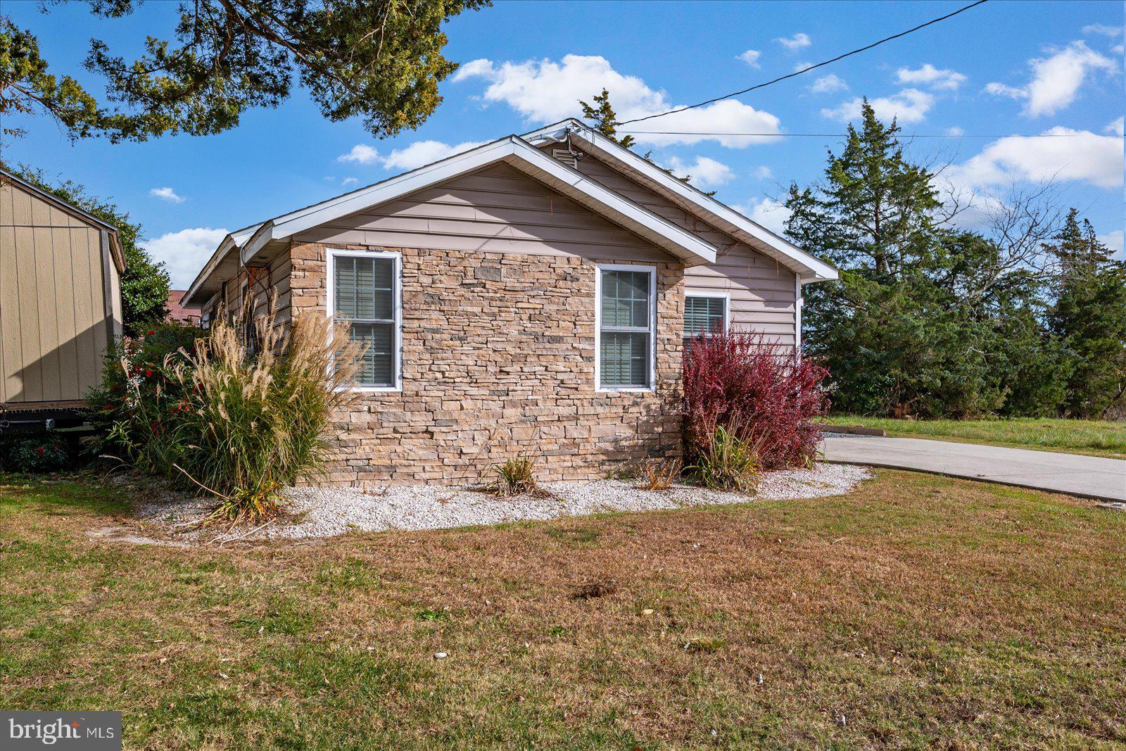 10428 Exeter Road Ocean City, MD 21842 - Photo 52 of 56 a view of a house with a yard