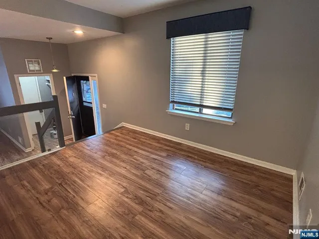 a view of a livingroom with a window