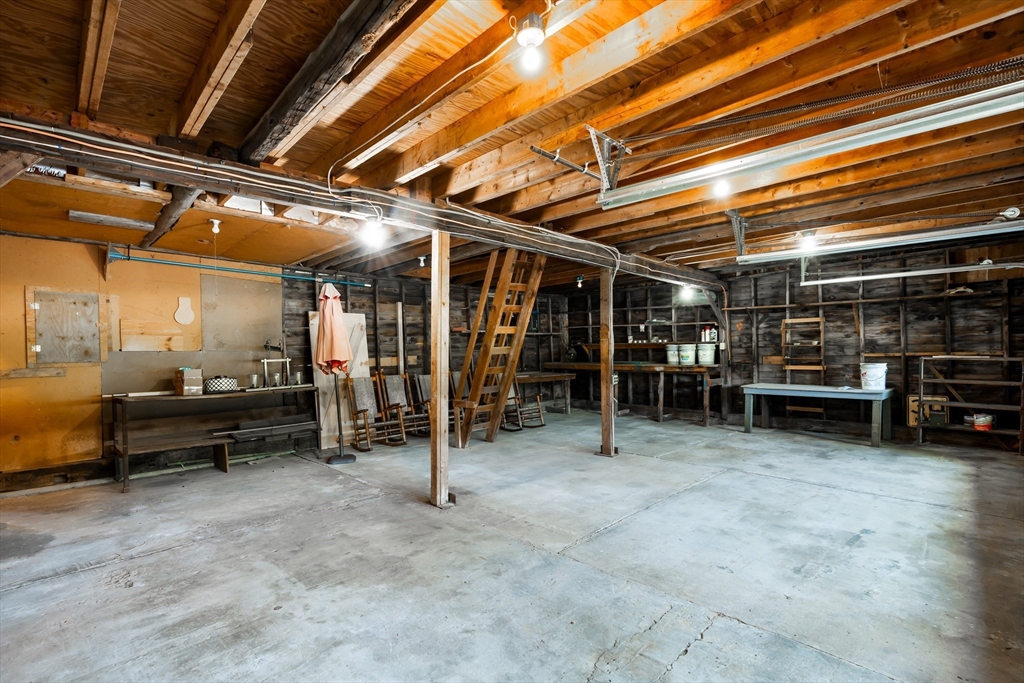 356 Hunt Road Oakham, MA 01068 - Photo 26 of 42 a view of empty room with wooden ceiling