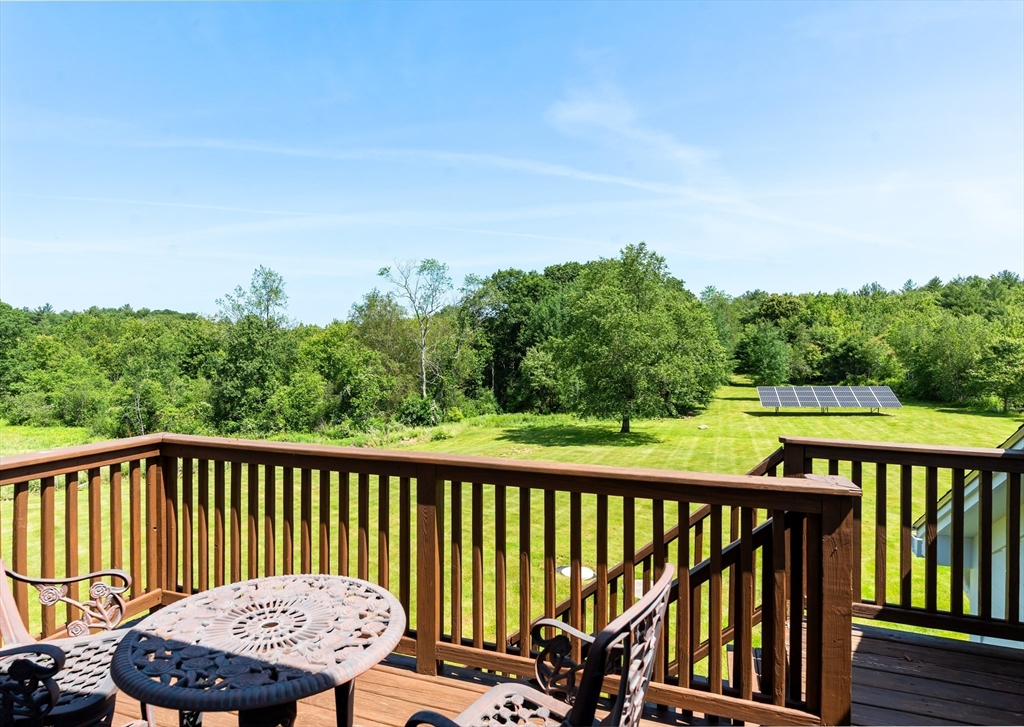 356 Hunt Road Oakham, MA 01068 - Photo 32 of 42 a view of a roof deck with furniture