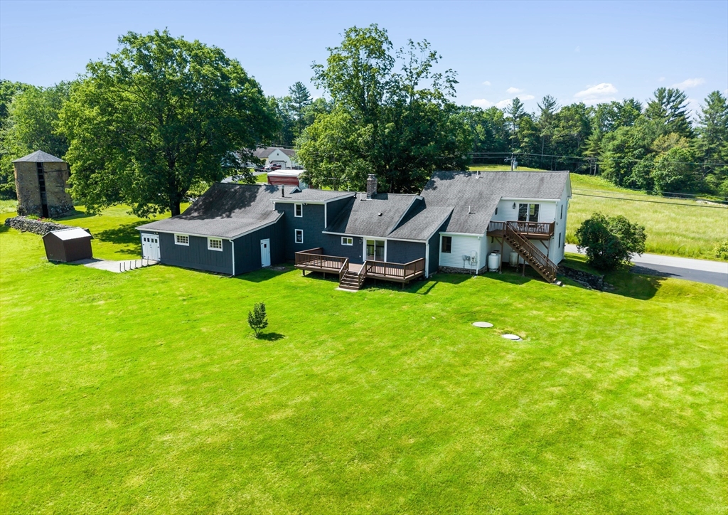 356 Hunt Road Oakham, MA 01068 - Photo 35 of 42 an aerial view of a house with swimming pool garden and patio