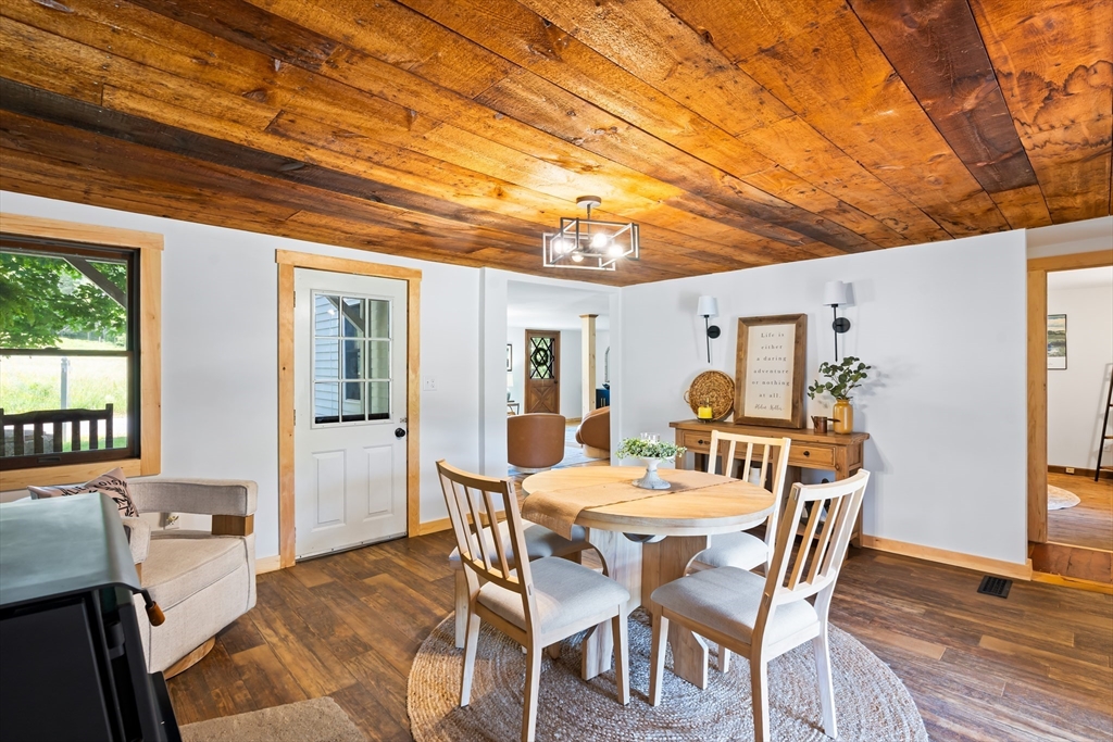 356 Hunt Road Oakham, MA 01068 - Photo 6 of 42 a dining room with furniture and window