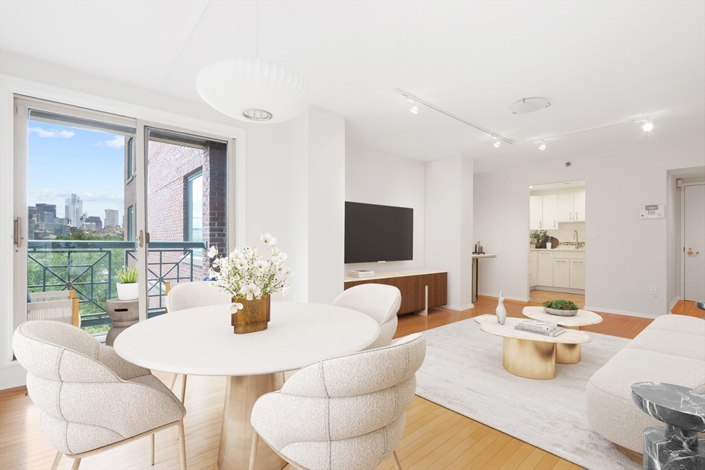 a living room with furniture and a table