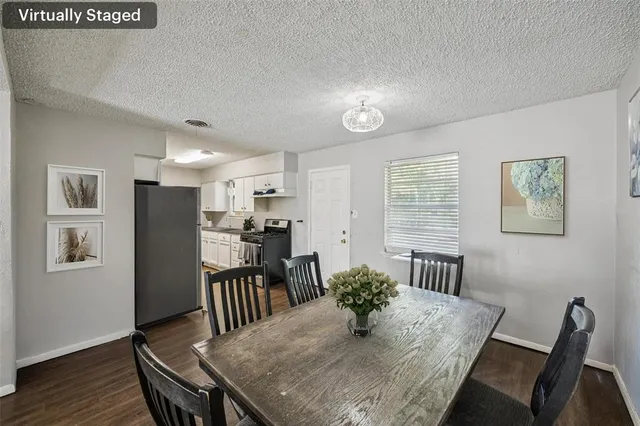 a view of a dining room with furniture
