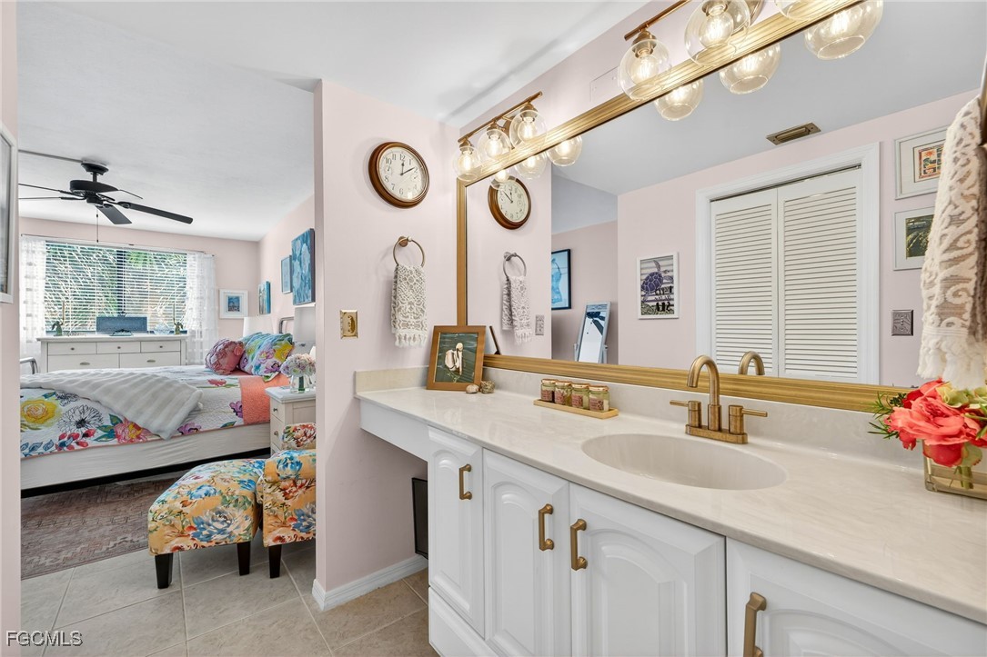 801 River Point Drive, Unit 203A Naples, FL 34102 - Photo 19 of 32 a very nice looking room with a large window