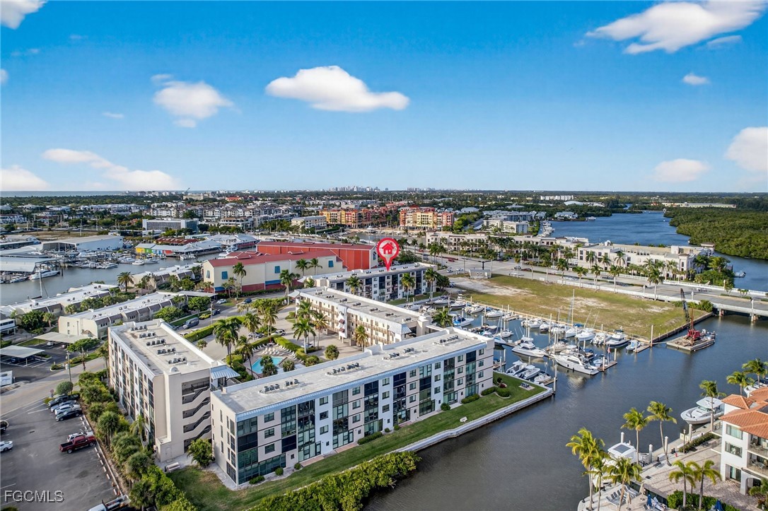 801 River Point Drive, Unit 203A Naples, FL 34102 - Photo 23 of 32 a view of a city with an ocean