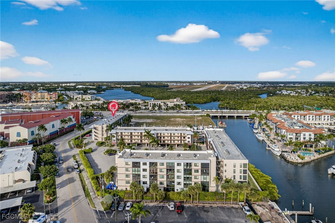 801 River Point Drive, Unit 203A Naples, FL 34102 - Photo 30 of 32 a view of a city