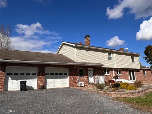 a view of a yard with an outdoor space