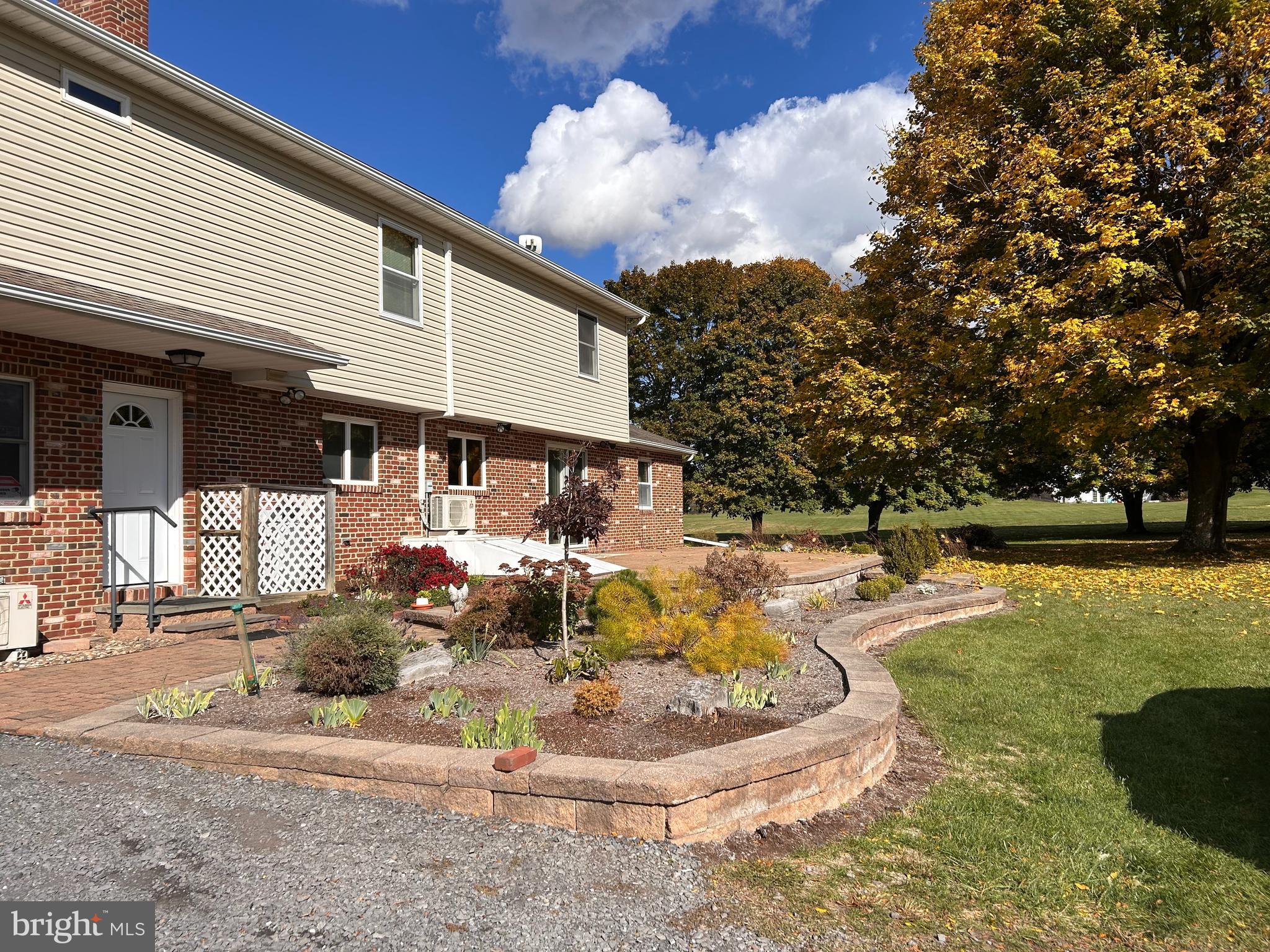 2068 Earlystown Road Centre Hall, PA 16828 - Photo 13 of 62 a view of a house with swimming pool and sitting area