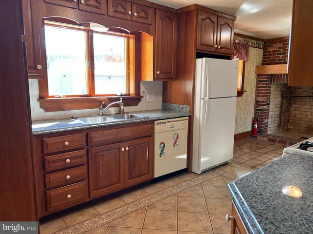 a view of living room with wooden floor