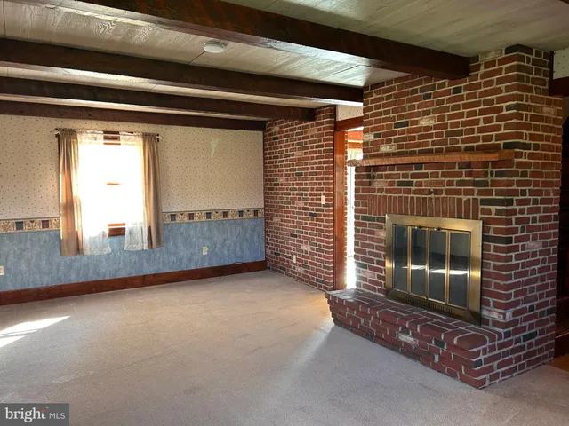 a view of a golf course with a house