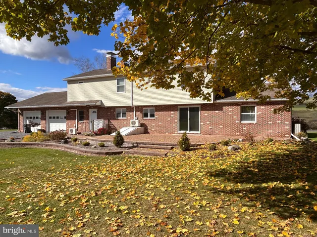 a view of a yard with an trees