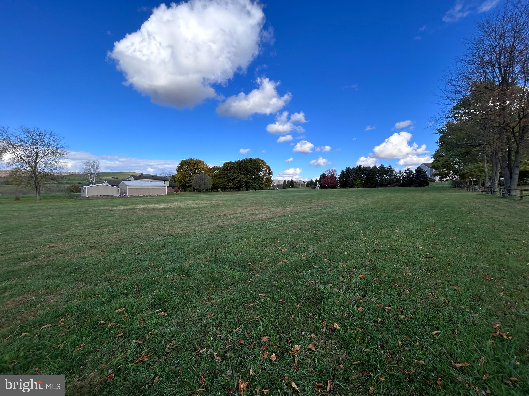 2068 Earlystown Road Centre Hall, PA 16828 - Photo 51 of 62 a view of a big yard with lots of green space and windows