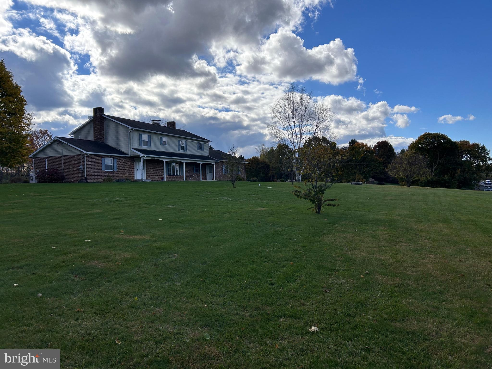 2068 Earlystown Road Centre Hall, PA 16828 - Photo 58 of 62 a view of a big yard with a house in the background