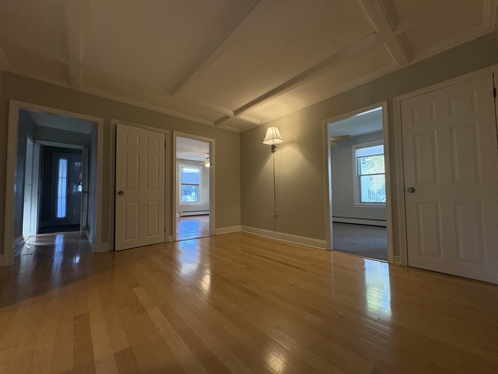 11 Franklin Street, Unit 1 Natick, MA 01760 - Photo 14 of 26 wooden floor with a bathroom