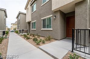 12347 Indigo Montage Road, Unit 3 Las Vegas, NV 89183 - Photo 2 of 23 Clean lines define this modern facade with a welcoming entry.