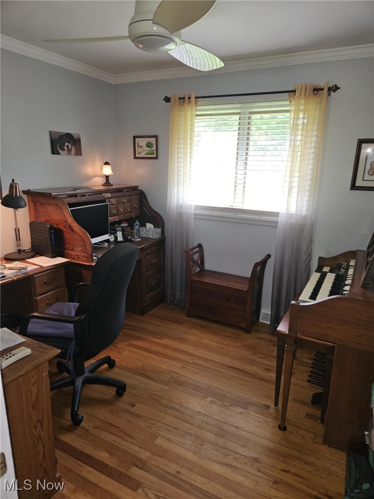 3084 Killian Road Uniontown, OH 44685 - Photo 18 of 38 Office area with wood finished floors, a ceiling fan, and ornamental molding