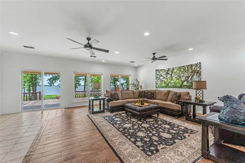 a living room with furniture and a rug