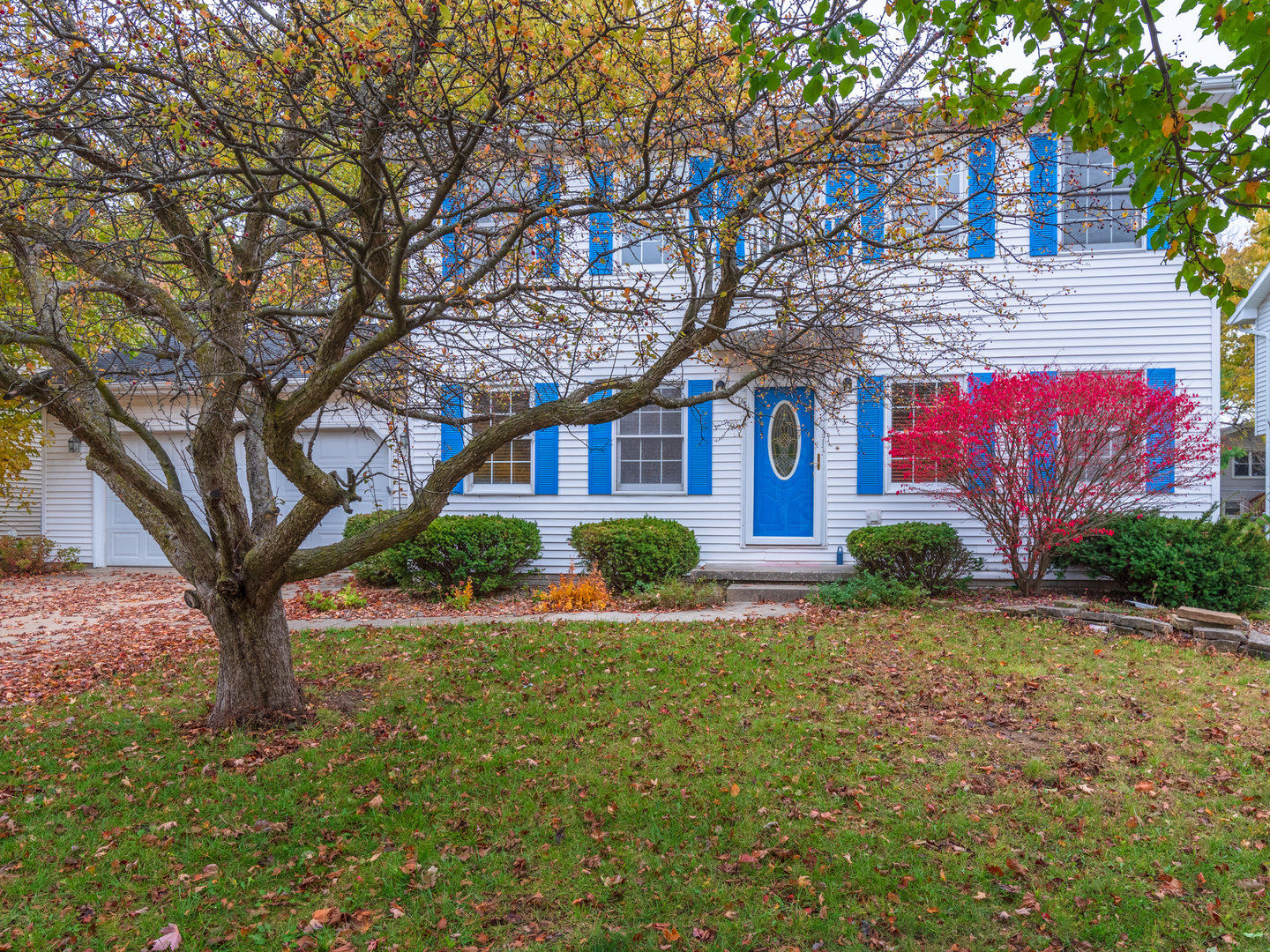116 North Blair Drive Normal, IL 61761 - Photo 1 of 41 a front view of a house with a yard and garage