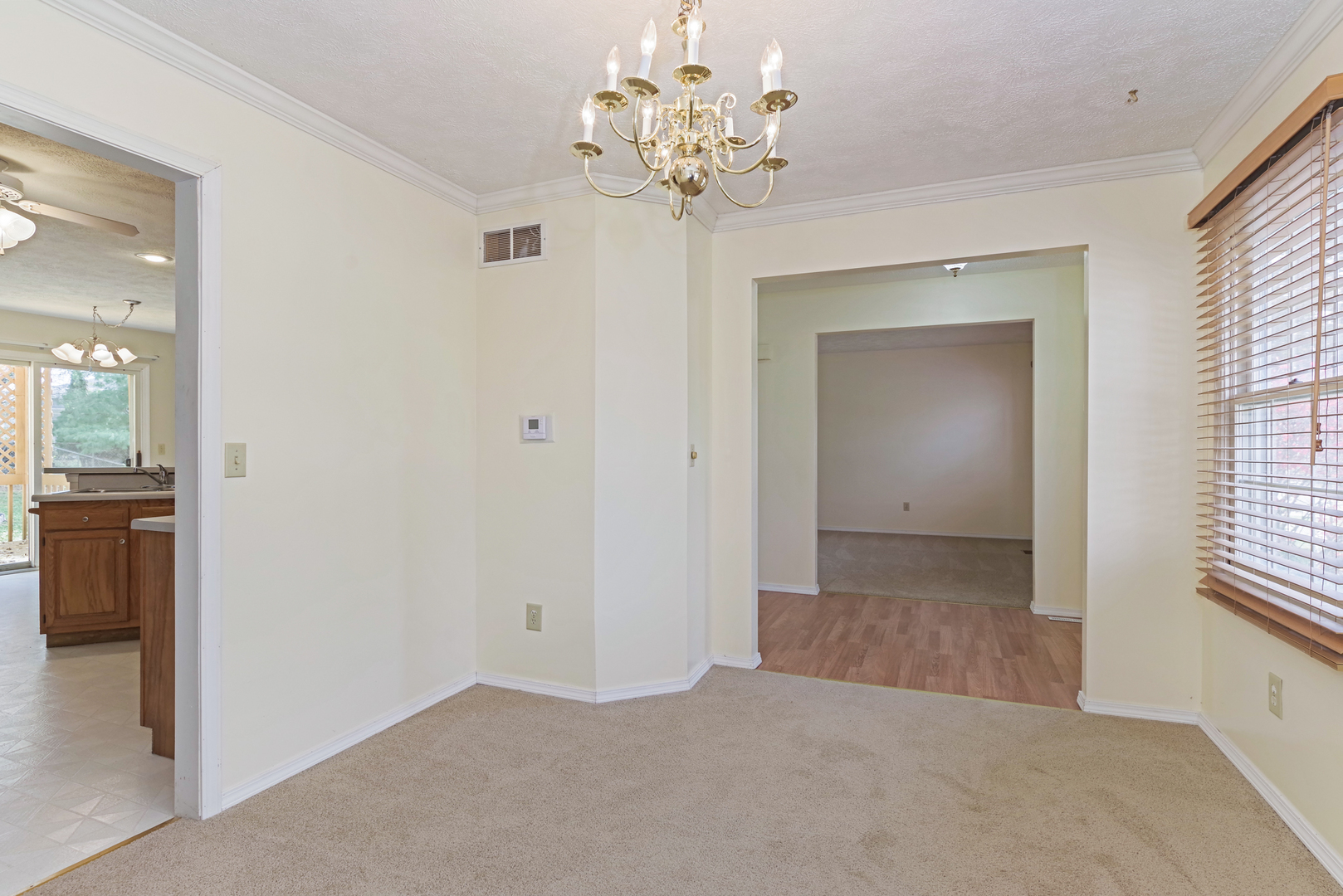 116 North Blair Drive Normal, IL 61761 - Photo 11 of 41 wooden floor in an empty room with a window