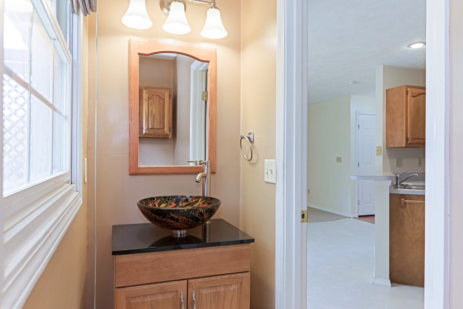 116 North Blair Drive Normal, IL 61761 - Photo 19 of 41 a bathroom with a granite countertop sink and a mirror