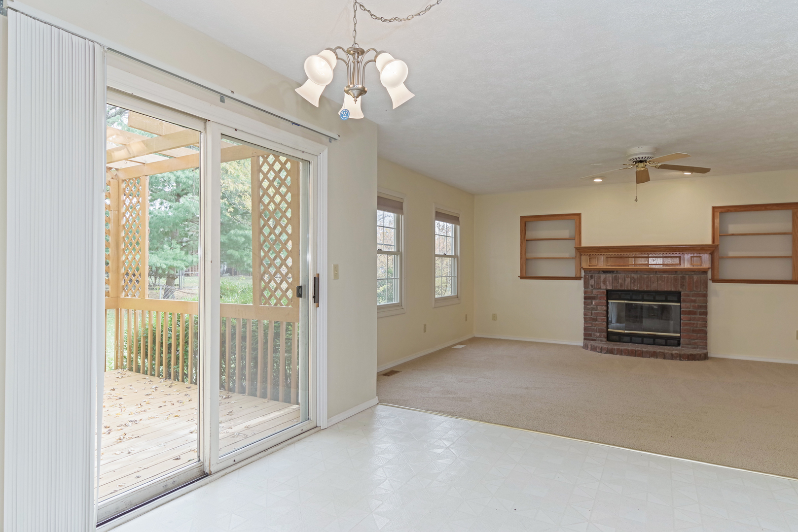 116 North Blair Drive Normal, IL 61761 - Photo 21 of 41 a view of a livingroom with a ceiling fan window and fire place