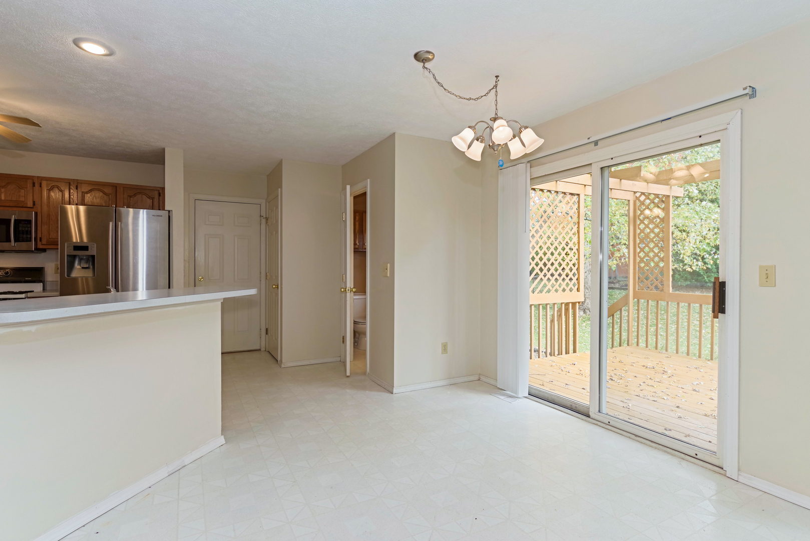 116 North Blair Drive Normal, IL 61761 - Photo 22 of 41 a view of a livingroom with a chandelier