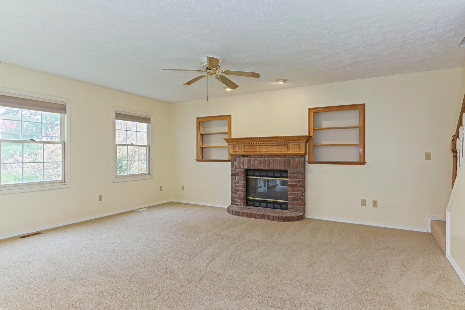 116 North Blair Drive Normal, IL 61761 - Photo 23 of 41 an empty room with windows fireplace and a small space