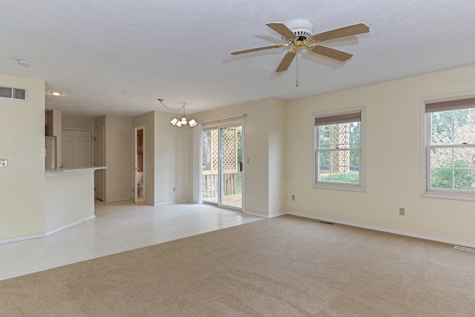116 North Blair Drive Normal, IL 61761 - Photo 25 of 41 a view of a livingroom with a ceiling fan and window