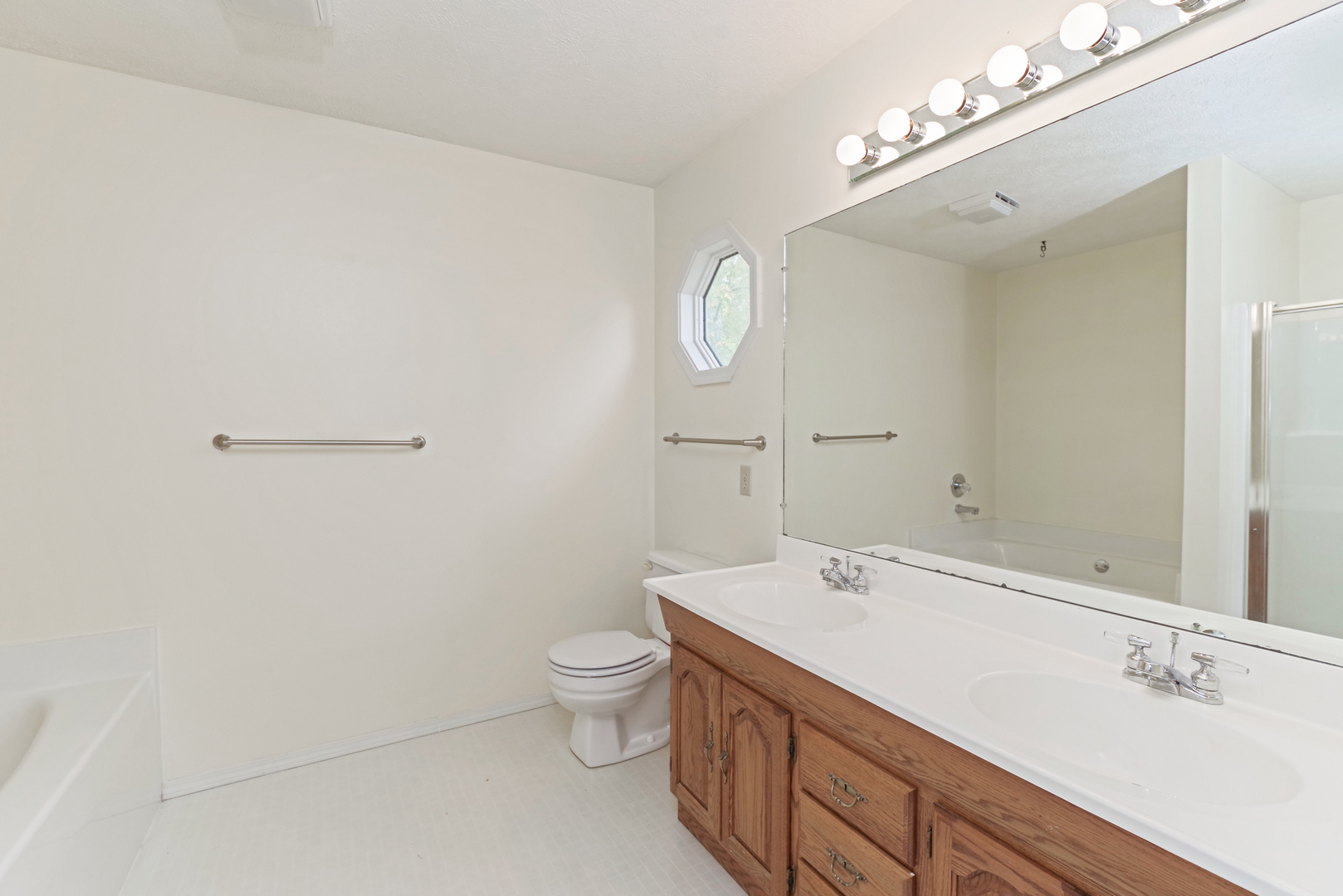 116 North Blair Drive Normal, IL 61761 - Photo 28 of 41 a bathroom with a sink a toilet and shower