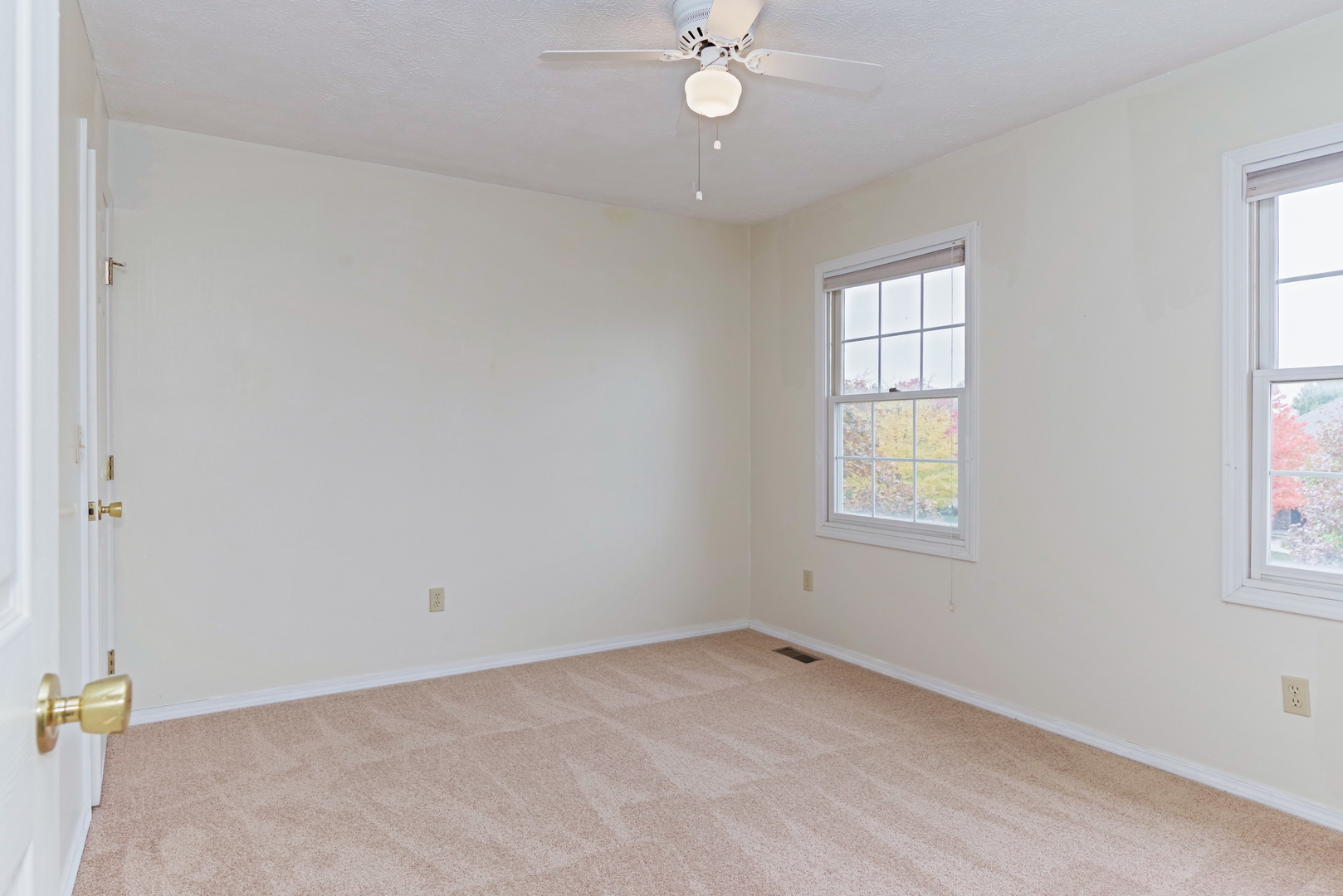 116 North Blair Drive Normal, IL 61761 - Photo 33 of 41 an empty room with windows and fan