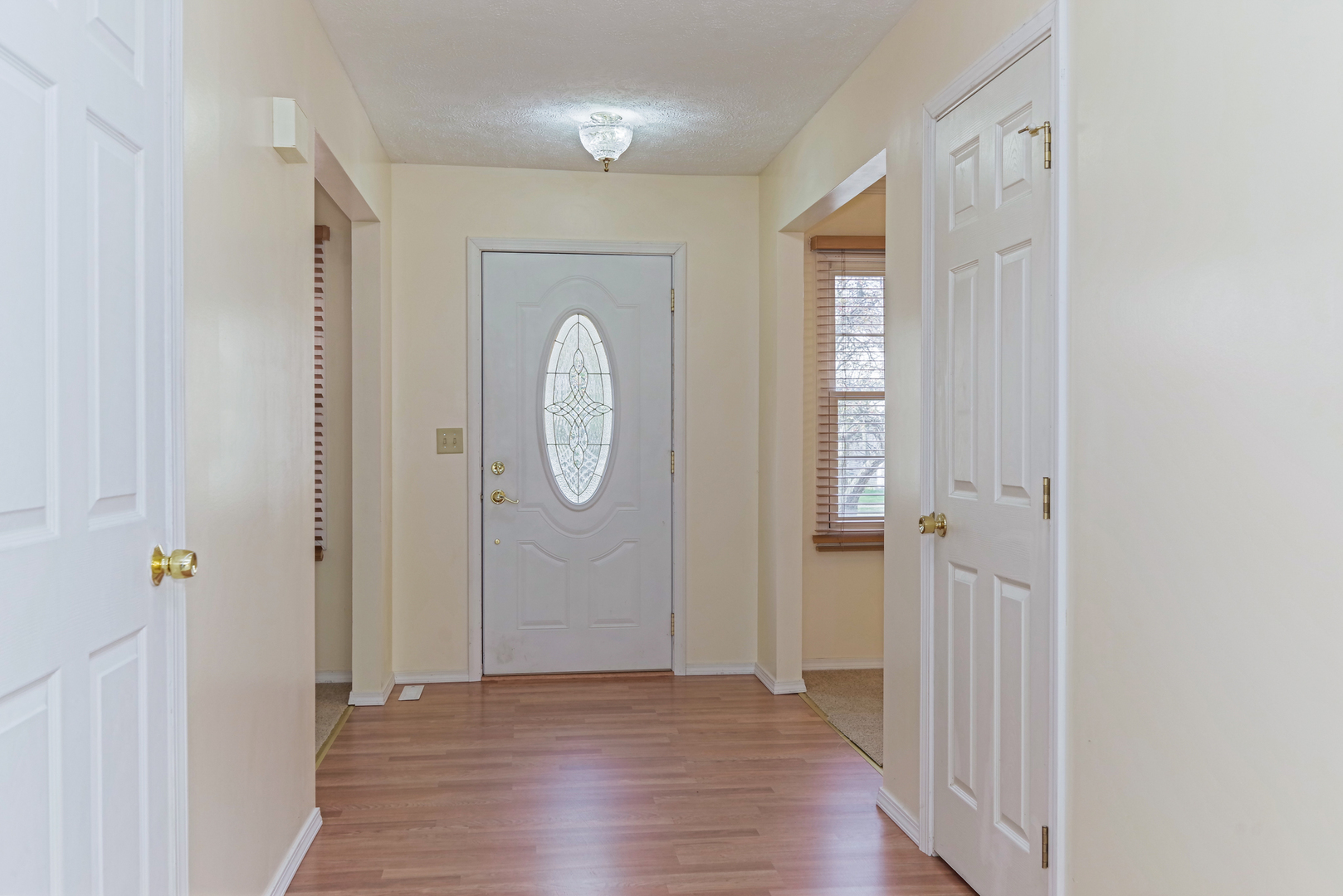 116 North Blair Drive Normal, IL 61761 - Photo 8 of 41 a view of a hallway with wooden floor